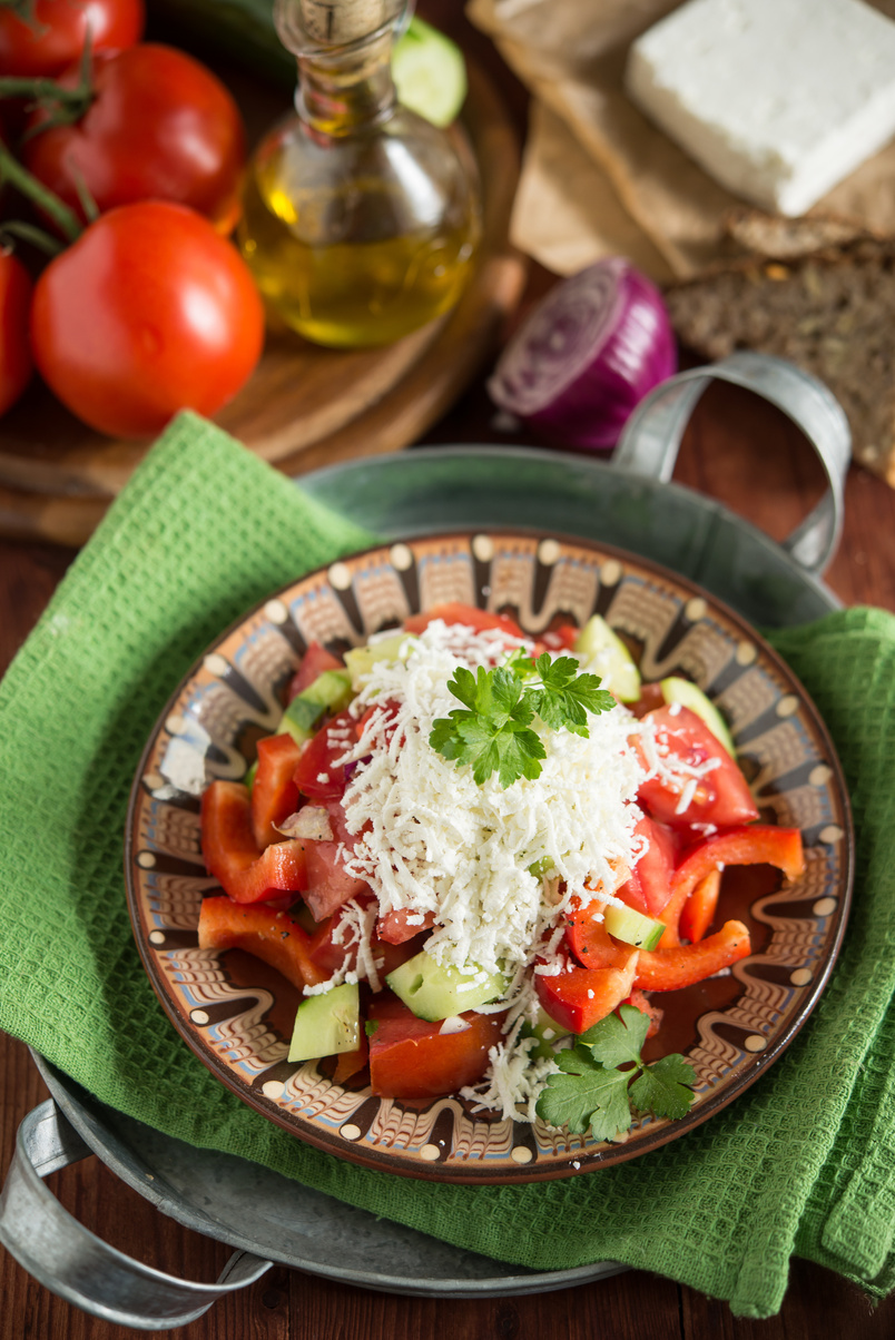 Shopska salad - traditional bulgarian salad with grated cheese